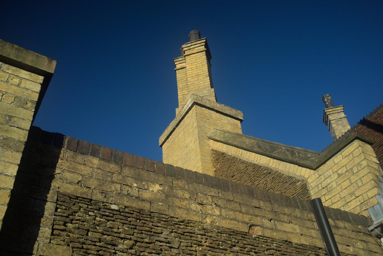 A look upwards to show the chimneys of the station building.