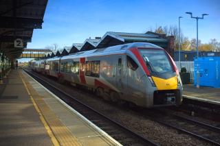 A class 755 sitting at March station. It is a modern 3-car diesel electric multiple unit, quite sleep and painted in Greater Anglia livery.
