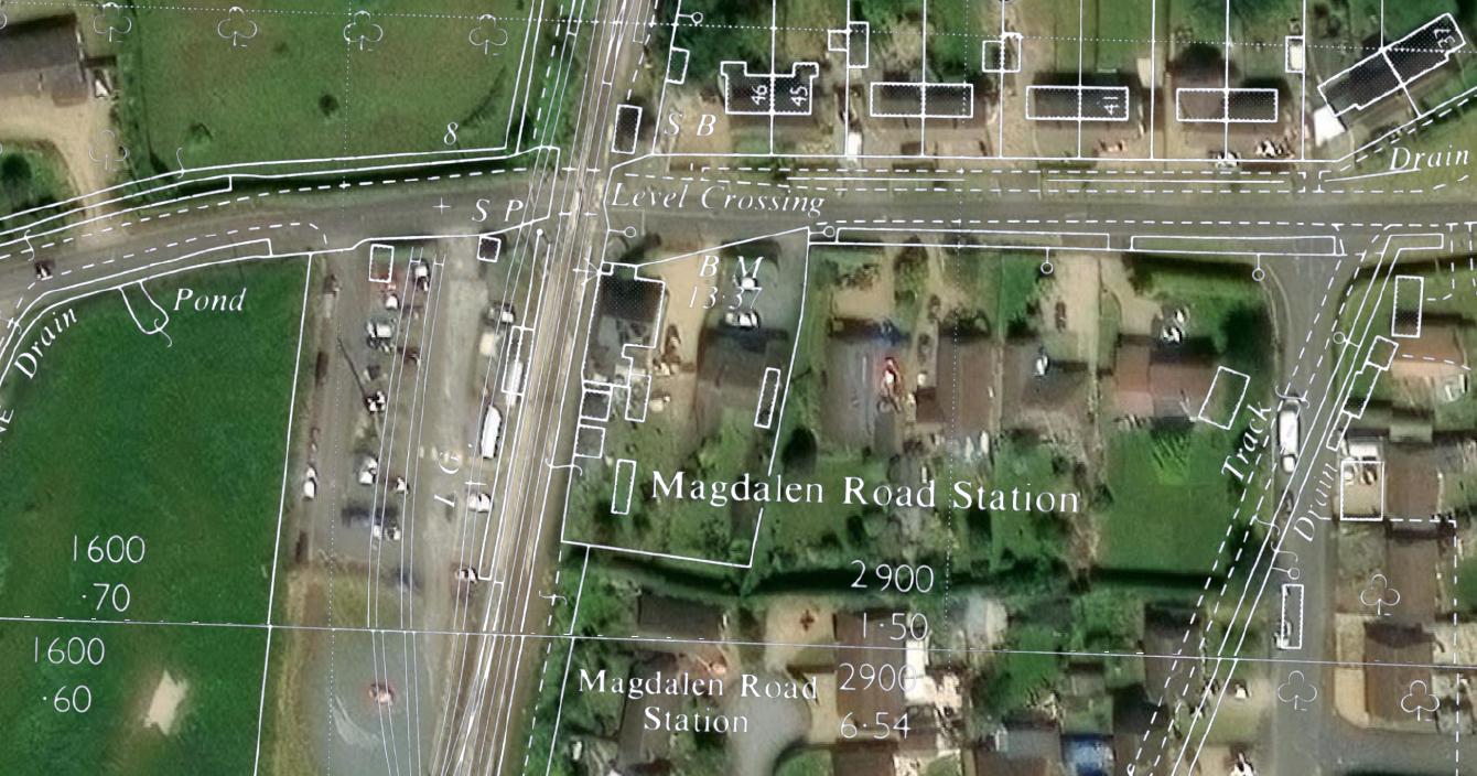 An old map overlaid on white onto modern satellite images; the comparison shows the former boundary of the station garden occupying about half the space of the old boundary.